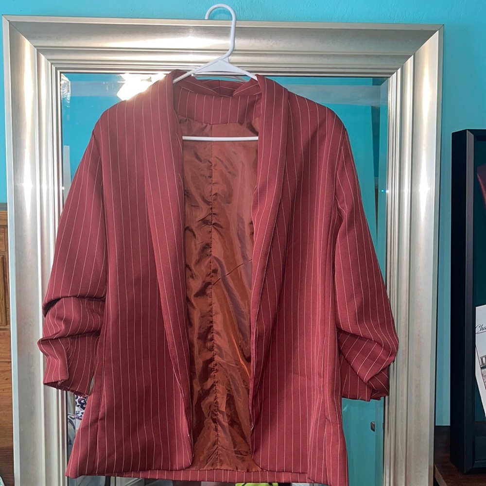 Maroon blazer with white stripes!